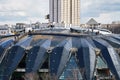 Construction workers repairing a roof of the Druzhba Multipurpose Arena in Moscow.