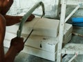 Construction workers are sawing a lightweight concrete brick Royalty Free Stock Photo