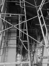 Construction workers on a scaffold. Black and white Royalty Free Stock Photo