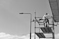 Construction workers on a scaffold. Black and white. Royalty Free Stock Photo