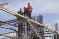 Construction workers setting rebar for a building