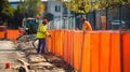 Construction Workers Setting Up Orange Safety Fence Royalty Free Stock Photo