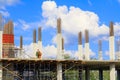 Construction workers site and building of housing at laborer work outdoor. which has sky background with copy space add text Royalty Free Stock Photo