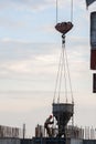 Construction workers at a construction site pouring concrete Royalty Free Stock Photo
