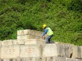 Construction workers stacking the maintain load test block also known as MLT test at the construction site. Royalty Free Stock Photo