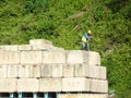 Construction workers stacking the maintain load test block also known as MLT test at the construction site. Royalty Free Stock Photo