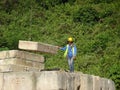 Construction workers stacking the maintain load test block also known as MLT test at the construction site. Royalty Free Stock Photo