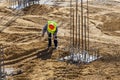 Construction workers and steel rebar reinforcement for poles Royalty Free Stock Photo