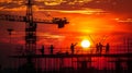 Construction workers at sunrise on a new building site Royalty Free Stock Photo