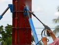 Workers use water to clean the post template. Royalty Free Stock Photo