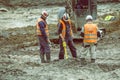 Construction workers using magnetic locator 3