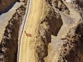 Construction workers walking on sidewalks in an open-pit mine Royalty Free Stock Photo