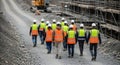 construction workers walking together at job site Royalty Free Stock Photo