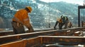 Construction Workers Welding Steel Beams on a Mountainside Royalty Free Stock Photo