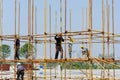 Construction workers working at building site