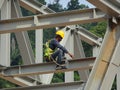 Construction workers working at height installing the steel structure. Royalty Free Stock Photo