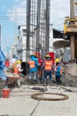 Construction workers working in site bridge piling