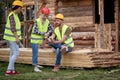 construction workers working on wooden house construct Royalty Free Stock Photo
