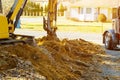 Construction works excavator moving earth Royalty Free Stock Photo