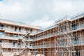 Construction works in progress at new residential multistorey apartment building made of brick and concrete block