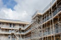 Construction works in progress at new residential multistorey apartment building made of brick and concrete block