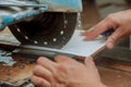 Construction works tiling with a circular saw a man sawing ceramic tiles worker sawing a tile