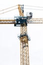 Construction yellow crane against the sky.