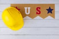 Construction yellow helmet on happy Labor Day USA patriotic a federal holiday of United States America Royalty Free Stock Photo