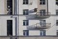 A constructivist house with balconies casting a shadow
