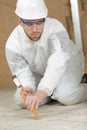 Constructon worker using hammer and chisel Royalty Free Stock Photo