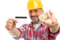 Constructor presenting card and focused bitcoin Royalty Free Stock Photo