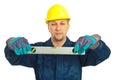 Constructor worker man holding level