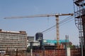 Constrution crane in front of high rise buildings in downtown Johannesburg Royalty Free Stock Photo