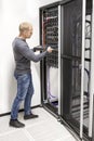 IT consultant build network rack in datacenter