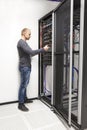 IT consultant build network rack in datacenter