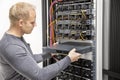IT consultant build network racks in datacenter Royalty Free Stock Photo