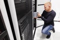 IT consultant install blade server in large datacenter Royalty Free Stock Photo