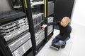 It consultant monitors servers in datacenter Royalty Free Stock Photo