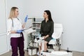 Consultation with gynecologist before colposcopy and pap test procedure to closely examine cervix, vagina and vulva of Royalty Free Stock Photo