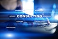 Consulting business concept. Text and icons on virtual screen. Royalty Free Stock Photo