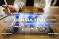 Consulting business concept. Text and icons on virtual screen. Royalty Free Stock Photo