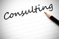Consulting written on a notepad Royalty Free Stock Photo