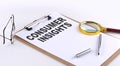 CONSUMER INSIGHTS text on clipboard on white background, business concept Royalty Free Stock Photo