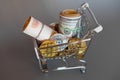 Shopping cart full of money dollar bitcoin rouble