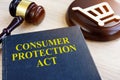 Consumer protection act and gavel on a table Royalty Free Stock Photo