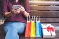 Consumerism, shopping, lifestyle concept, Young woman sitting ne