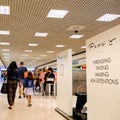 Consumers Walking Through a Shopping Mall Royalty Free Stock Photo