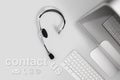 Contact concept , top view desk with headset, computer and conta Royalty Free Stock Photo