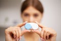 Contact Eye Lens, Closeup Of Woman Hands Holding White Eyelense Container. Royalty Free Stock Photo