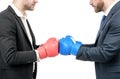 Contact. Fighting men cropped view. Businessmen fight with boxing gloves. Fighting conflict